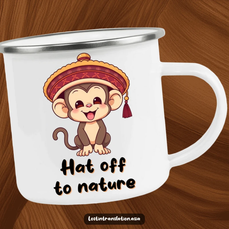 Funny Monkey Camping Mug, comically trying to wear an oversized hat, bringing humor to outdoor coffee breaks.