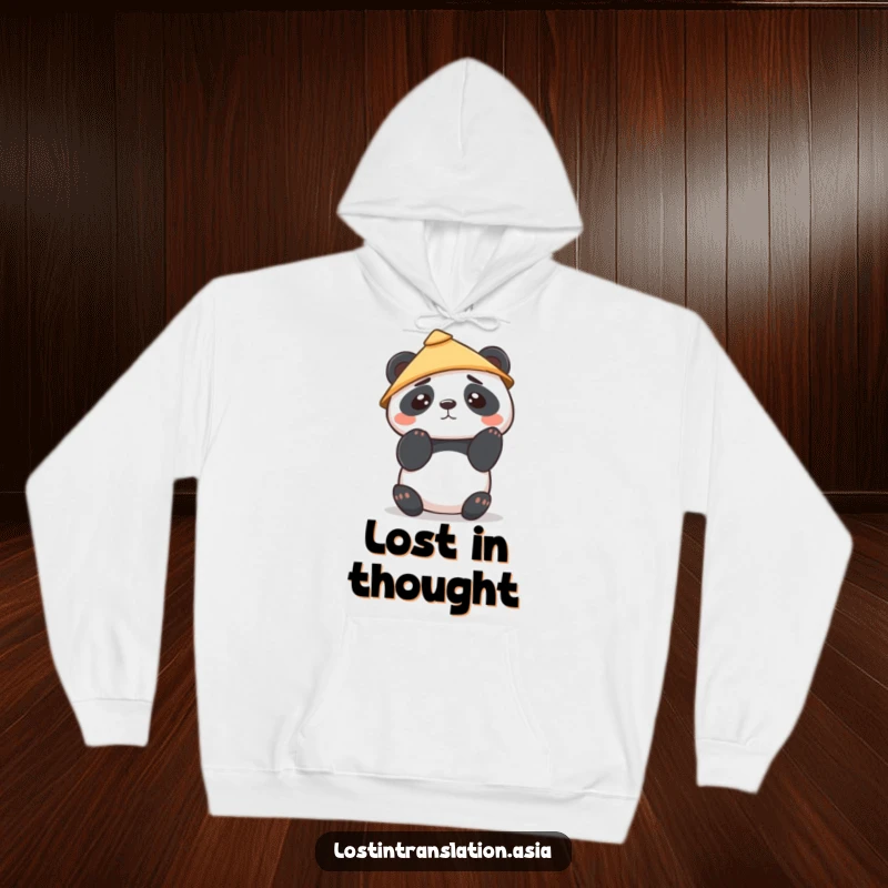 Funny Kawaii Panda Hoodie features a cute panda wearing a conical hat, looking confused, offering warmth and a dash of endearing bewilderment.