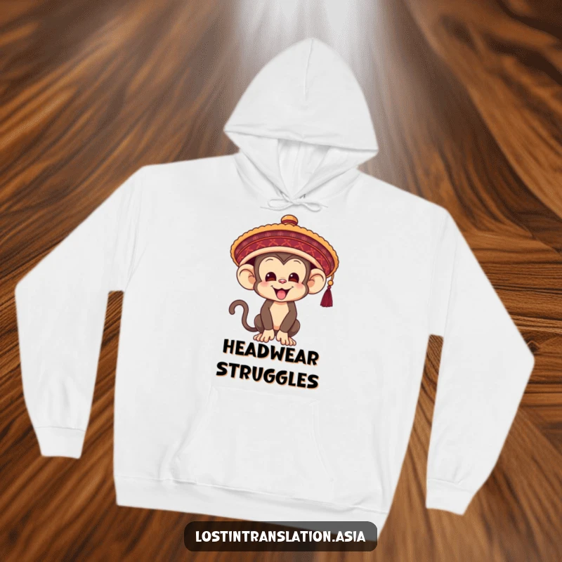 Funny Monkey Hoodie, comically attempting to fit into an oversized hat, blending warmth with hilarious primate antics.