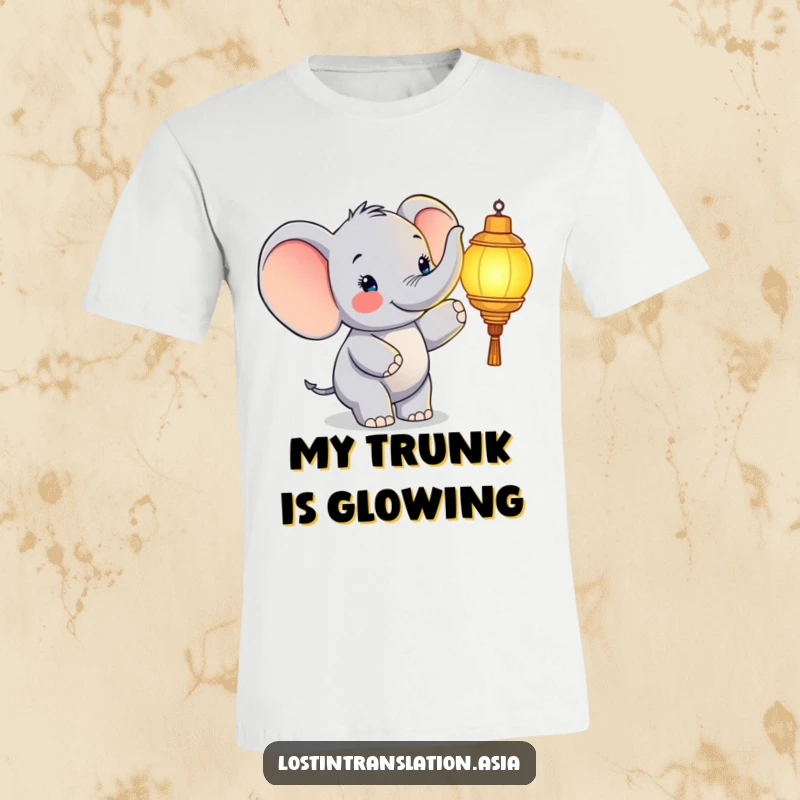 Funny elephant t-shirt, character pointing at glowing lantern, happy, joyful, spreading light, great funny gift.