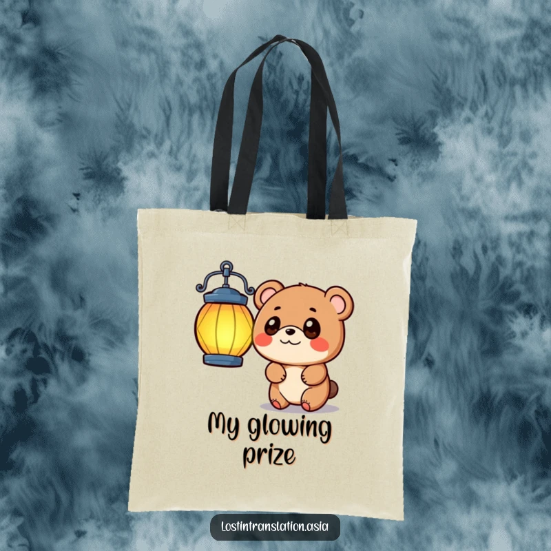 Funny playful bear with wide eyes tilting head at a vibrant lantern, a cute and humorous tote bag.